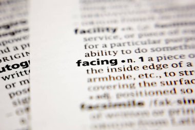 Word or phrase facing in a dictionary.