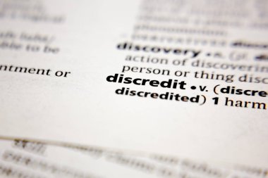Word or phrase discredit in a dictionary.