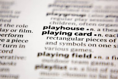 Word or phrase playing card in a dictionary.