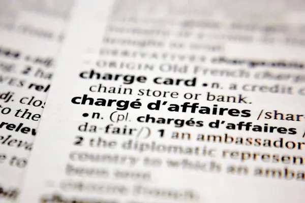 Word or phrase charge d'affaires in a dictionary. — Stock Photo, Image