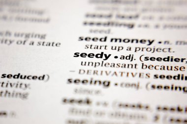 Word or phrase seedy in a dictionary.