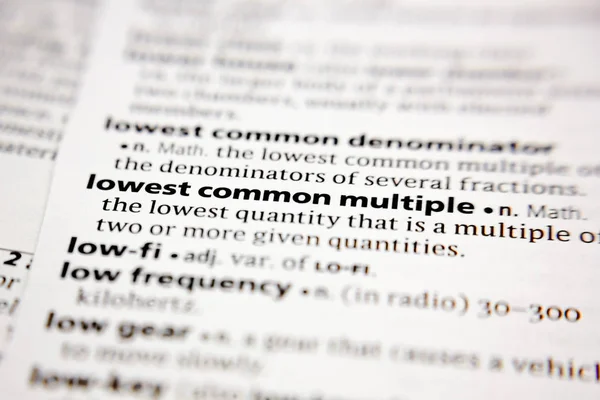 Word or phrase lowest common multiple in a dictionary. — Zdjęcie stockowe