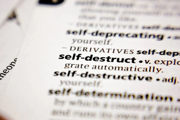 Word or phrase self-destruct in a dictionary. — Stock Photo, Image