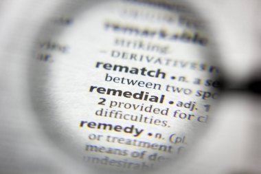 Sözlükte düzeltici sözcük veya tümcecik.