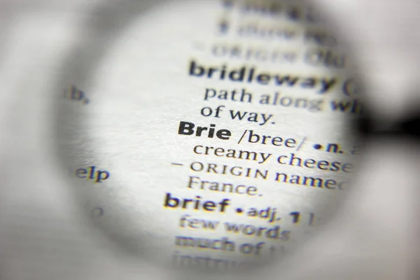 A palavra ou frase Brie em um dicionário . — Fotografia de Stock