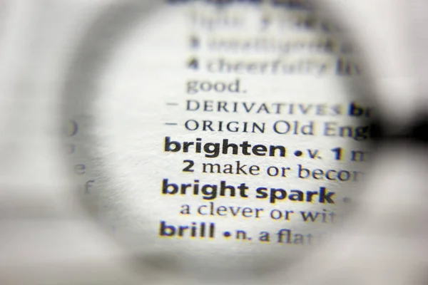 The word or phrase Brighten in a dictionary. — Stock Photo, Image