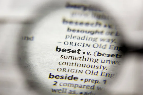 The word or phrase Beset in a dictionary. — Stock Photo, Image