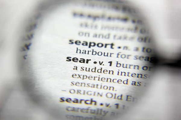 Слово или словосочетание Sear в словаре . — стоковое фото