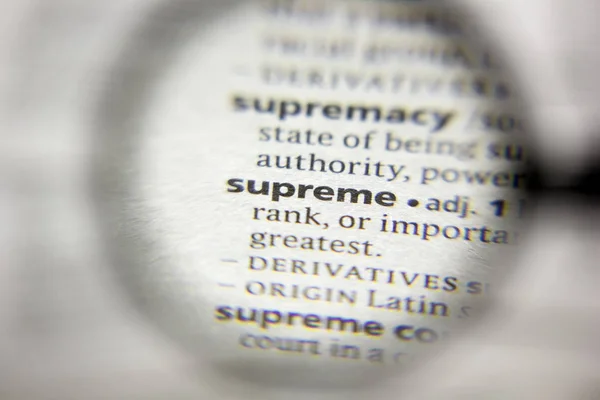 The word or phrase Supreme in a dictionary. — Stock Photo, Image