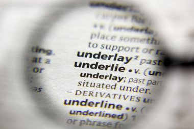 Sözlükteki Underlie sözcüğü veya tümceciği.