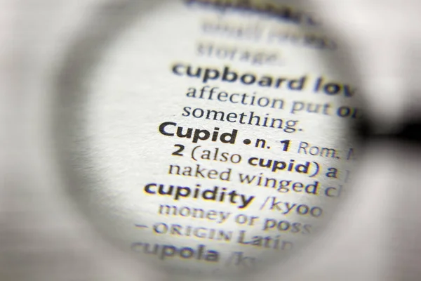 The word or phrase Cupid in a dictionary. — Stock Photo, Image