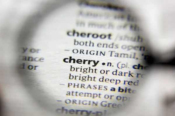 A palavra ou frase Cereja em um dicionário . — Fotografia de Stock