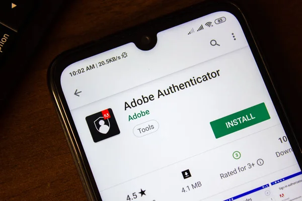 Ивановск, Россия - 07 июля 2019 года: приложение Adobe Authenticator на дисплее смартфона или планшета . — стоковое фото