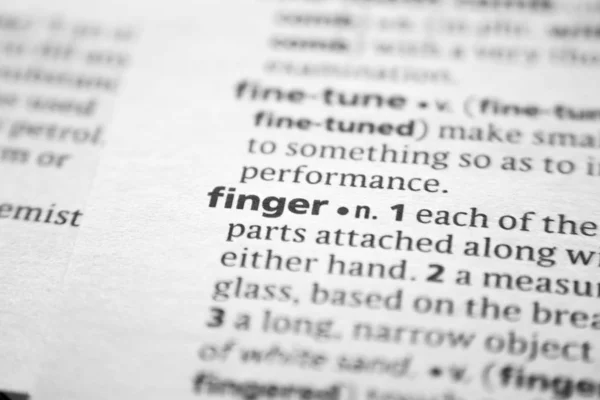 Word or phrase Finger in a dictionary. — Stock Photo, Image