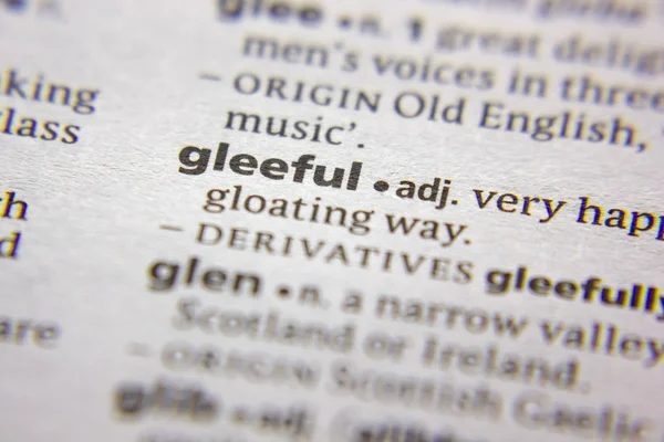 Palabra o frase Gleeful en un diccionario . — Foto de Stock