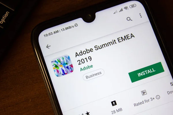 Ивановск, Россия - 07 июля 2019 года: приложение Adobe Summit EMEA 2019 на дисплее смартфона или планшета. — стоковое фото