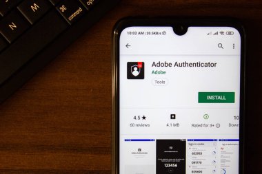 Ivanovsk, Rusya - 07 Temmuz 2019: Akıllı telefon veya tablet ekranında Adobe Authenticator uygulaması.