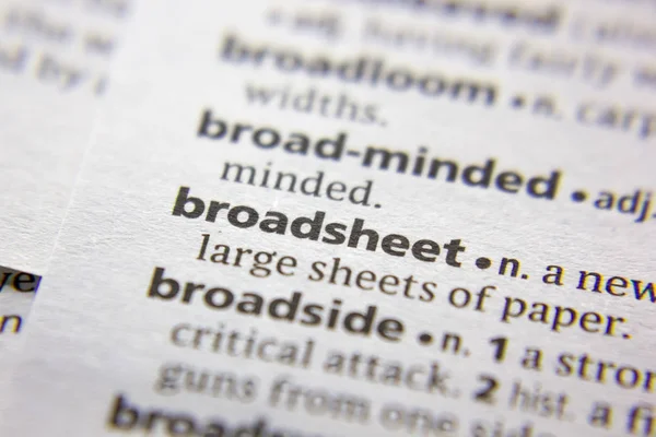Слово или словосочетание Broadsheet in a dictionary . — стоковое фото