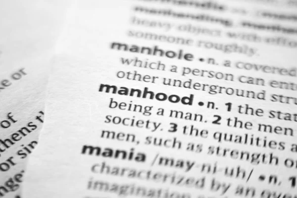 Word or phrase Manhood in a dictionary. — Stock Photo, Image