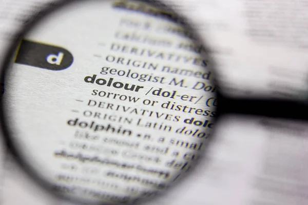 Ord eller fras Dolour i en ordbok. — Stockfoto