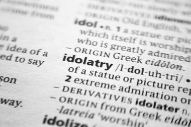 Word or phrase Idolatry in a dictionary. clipart