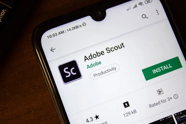 Ивановск, Россия - 07 июля 2019 года: Adobe Scout app on the display of smartphone or tablet . — стоковое фото