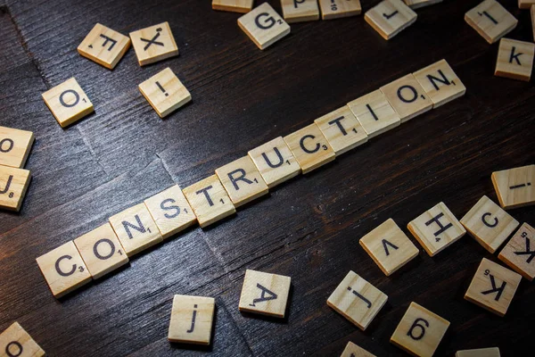 Palabra o frase Construcción hecha con letras de scrabble . — Foto de Stock