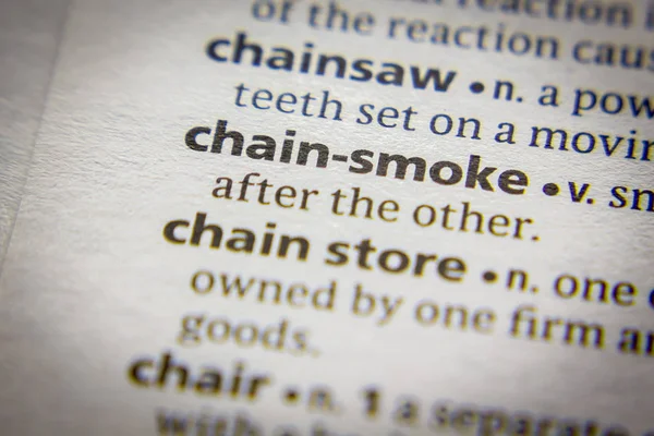 Word or phrase Chain-smoke in a dictionary.