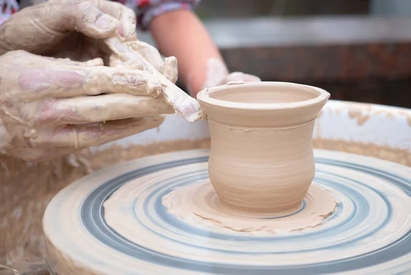 Potter forming a ceramic jug on pottery wheel — Stock Photo, Image