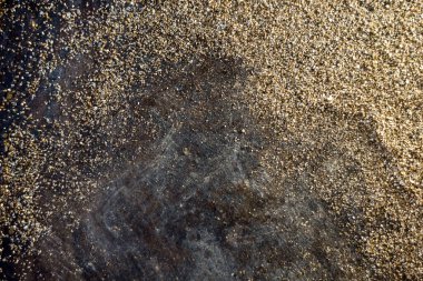 Altın arkaplan - siyah arkaplanda altın tozu