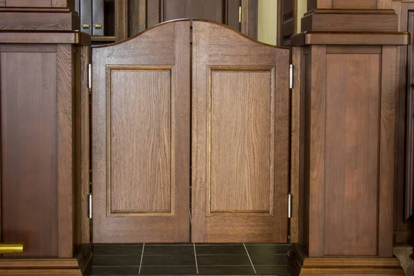 Western saloon swinging doors, wooden brown doors.