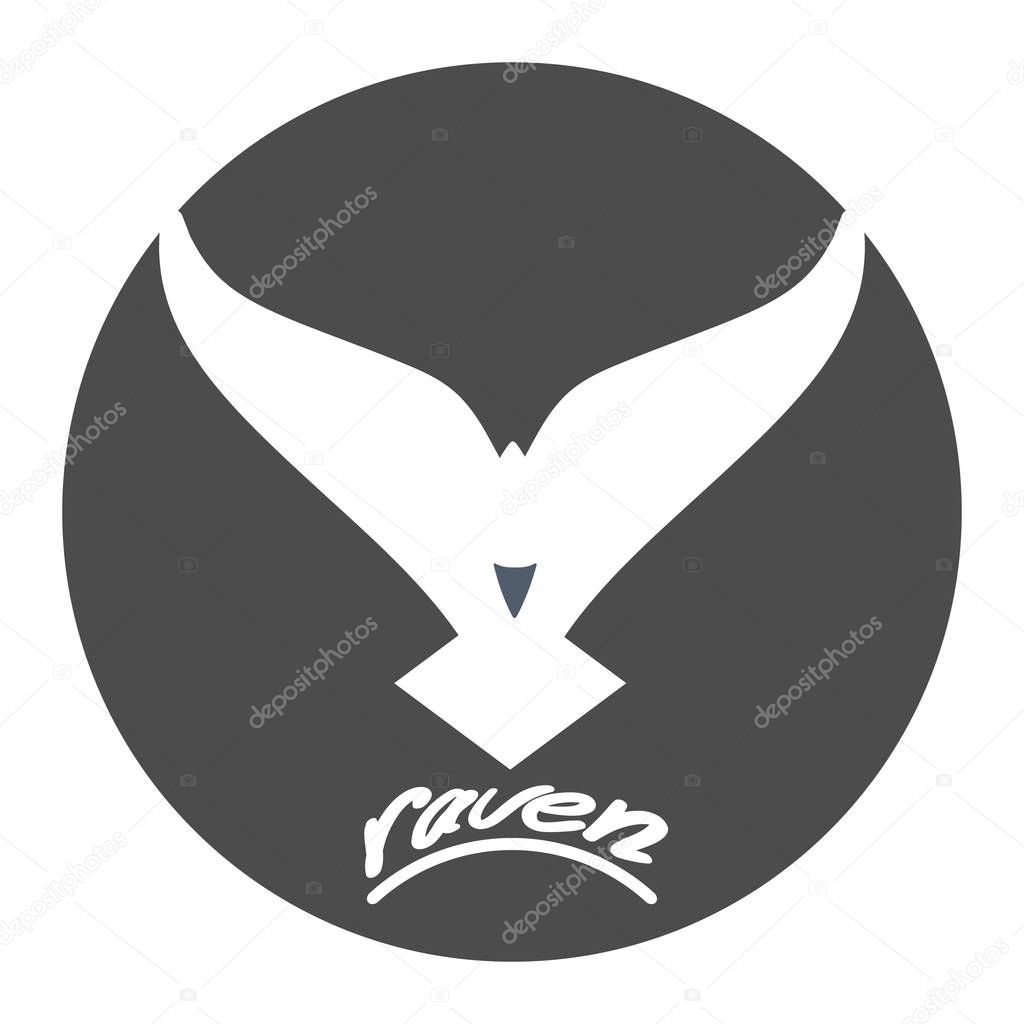 Spread winged raven in a circle graphic.