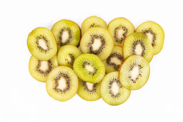 A small pile of freshly sliced kiwis is placed on the top of a white background.