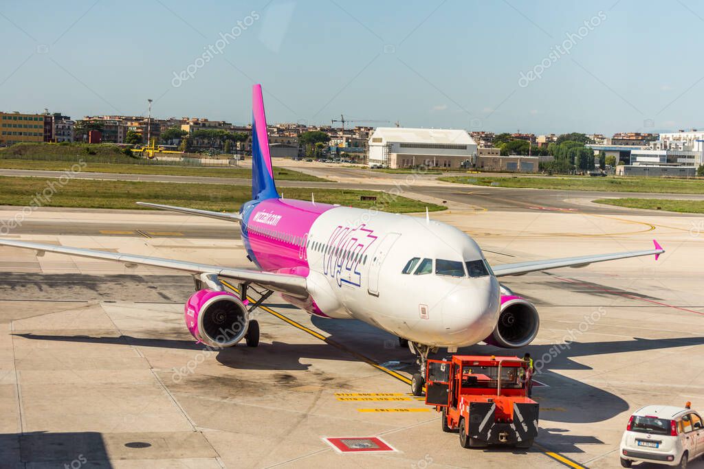 Aircraft of the Wizz air stopped at the apron of Naples international airport Capodichino, Italy