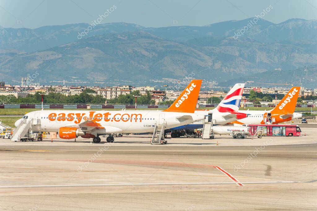 Aircrafts of the EasyJet stopped at the apron of Naples international airport Capodichino, Italy