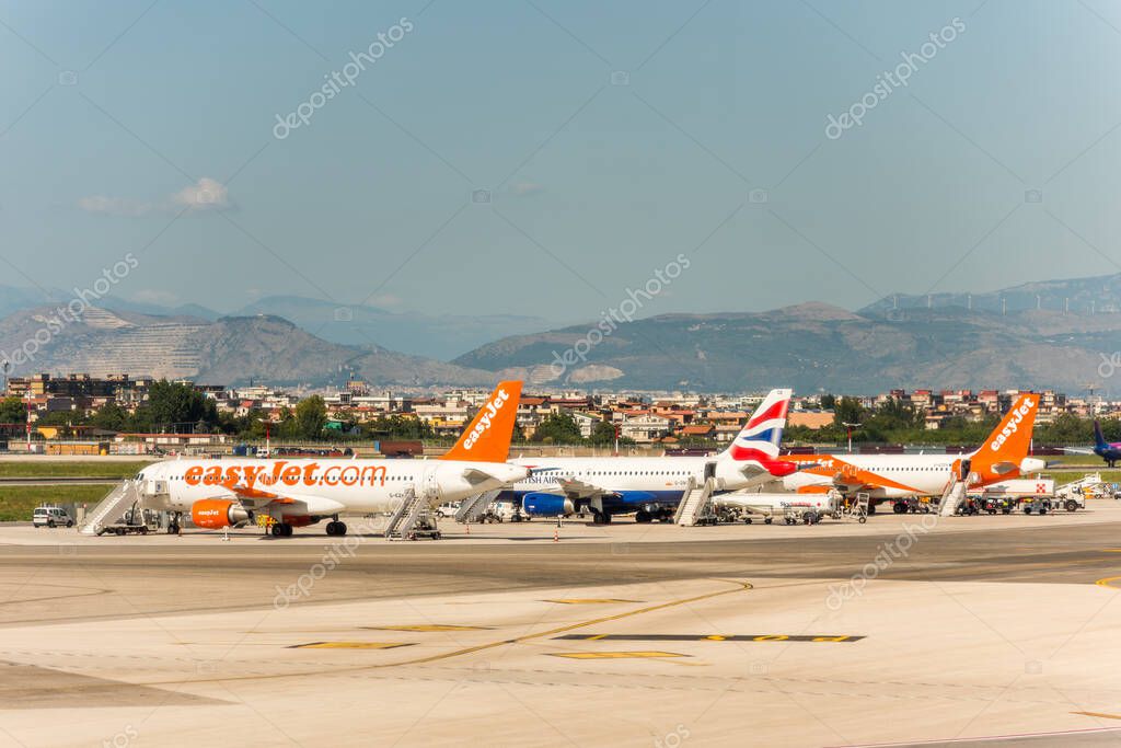 Aircrafts of the EasyJet stopped at the apron of Naples international airport Capodichino, Italy