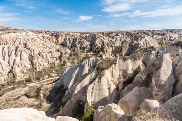 Red Valley and Rose Valley of Goreme of Nevsehir in Cappadocia, Turkey. Red Valley and Rose Valley Cappadocia get their name from the pinkish red-coloured rock