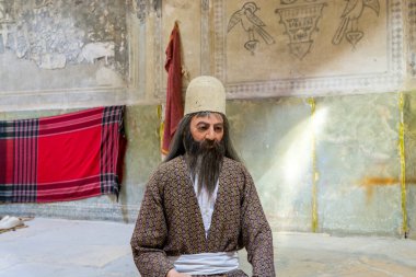 İran 'ın Shiraz kentinde eski bir hamam olan Vakil Bath' ın içi balmumu heykeli. Karim Khan Zand döneminde inşa edilen kraliyet bölgesinin bir parçasıydı..
