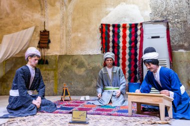 İran 'ın Shiraz kentinde eski bir hamam olan Vakil Bath' ın içi balmumu heykeli. Karim Khan Zand döneminde inşa edilen kraliyet bölgesinin bir parçasıydı..