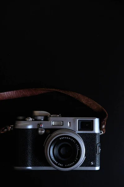 Retro camera with leather strap — Stock Photo, Image