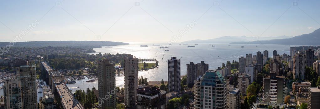Beautiful aerial panoramic cityscape view during a vibrant sunny day. Taken in Downtown Vancouver, British Columbia, Canada.