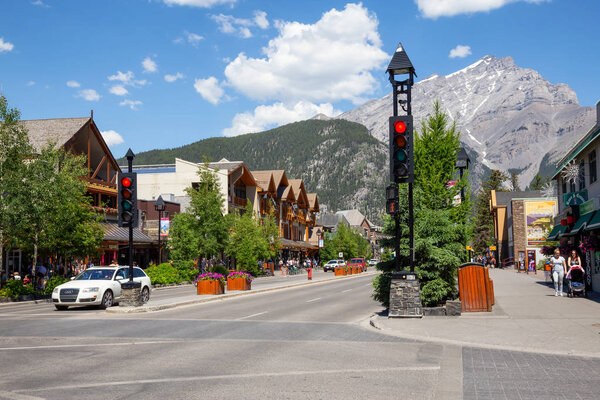 Banff, Alberta, Canada - June 20, 2018: Downtown of a Touristic City during a sunny summer day.