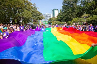 Downtown Vancouver, British Columbia, Canada - August 5, 2018: People celebrating at the Gay Pride Parade. clipart
