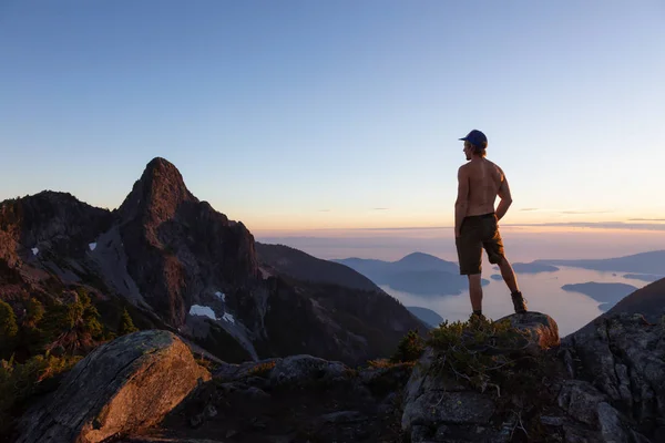 Man Top Mountain Enjoying Beautiful View Vibrant Summer Sunset Taken — Stock Photo, Image