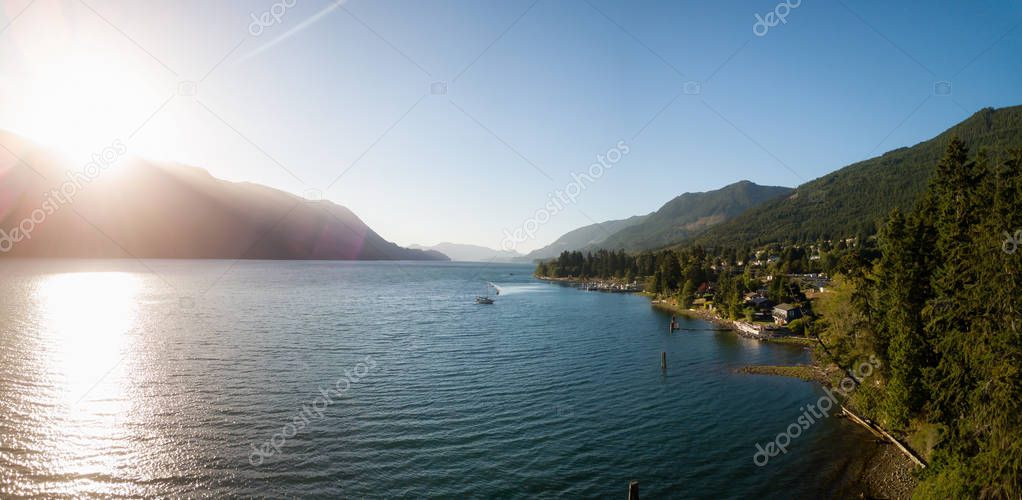 Aerial panoramic view of a small town, Port Alice, during a sunny summer sunset. Located in Northern Vancouver Island, BC, Canada.