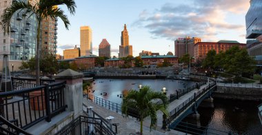 Downtown Providence, Rhode Island, United States - October 25, 2018: Panoramic view of a modern cityscape during a vibrant sunset. clipart
