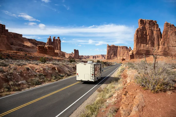 Camper Riding Scenic Road Red Rock Canyons Vibrant Sunny Day Stock Picture