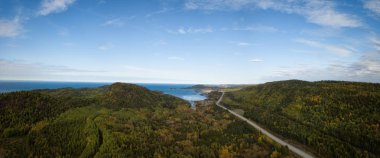 Aerial panoramic landscape view of Bic National Park during a vibrant sunny day. Taken in Le Bic, Rimouski, Quebec, Canada. clipart