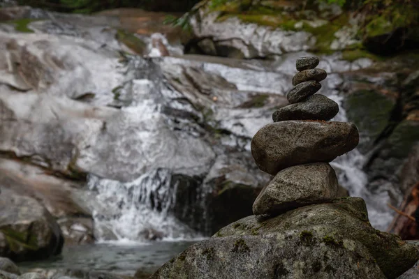 Stack of Rocks near a waterfall. Taken in Mt Fromme, North Vancouver, British Columbia, Canada.