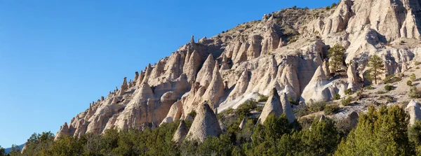 Beautiful American Landscape during a sunny evening. Taken in Kasha-Katuwe Tent Rocks National Monument, New Mexico, United States.